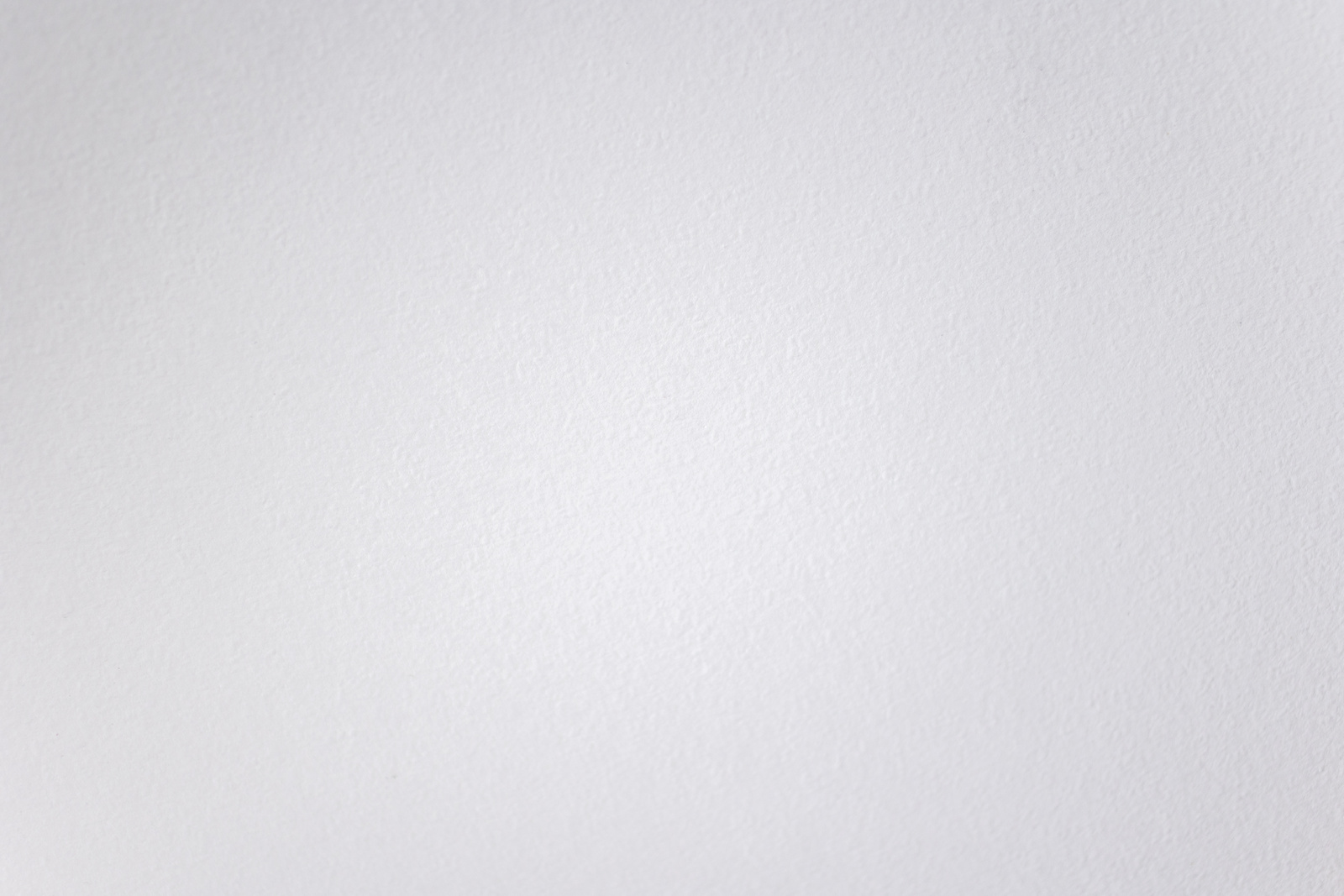 Close-Up Shot of a White Wall